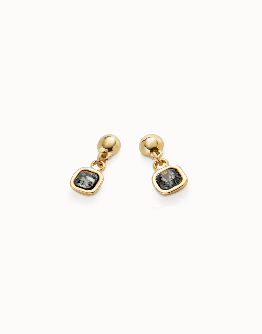 Aros Uno de 50 bañados en oro 18k con cristal colgante negro