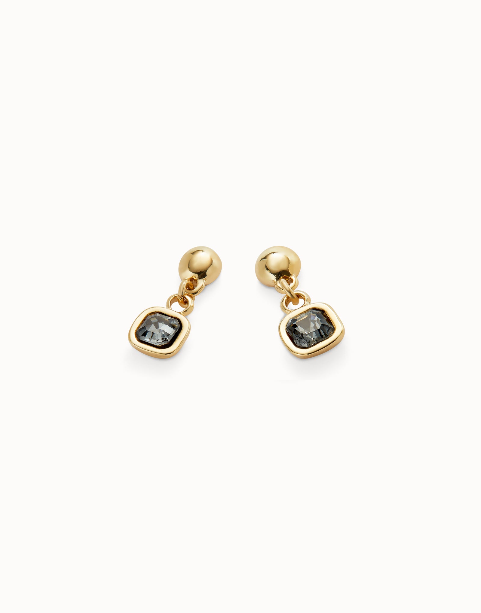 Aros Uno de 50 bañados en oro 18k con cristal colgante negro