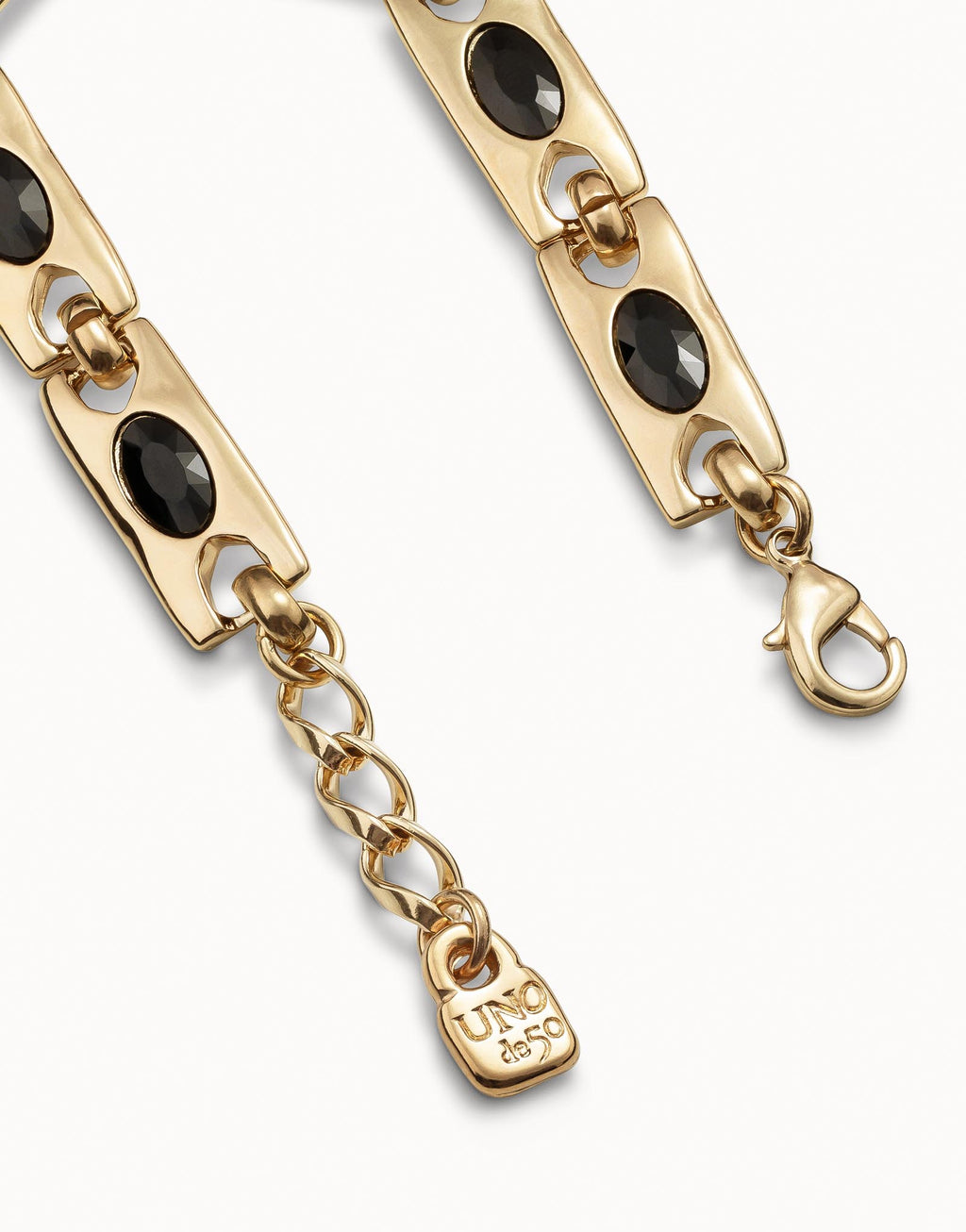 Pulsera Uno de 50 The Crown bañada en oro de 18k con eslabones y cristales negros