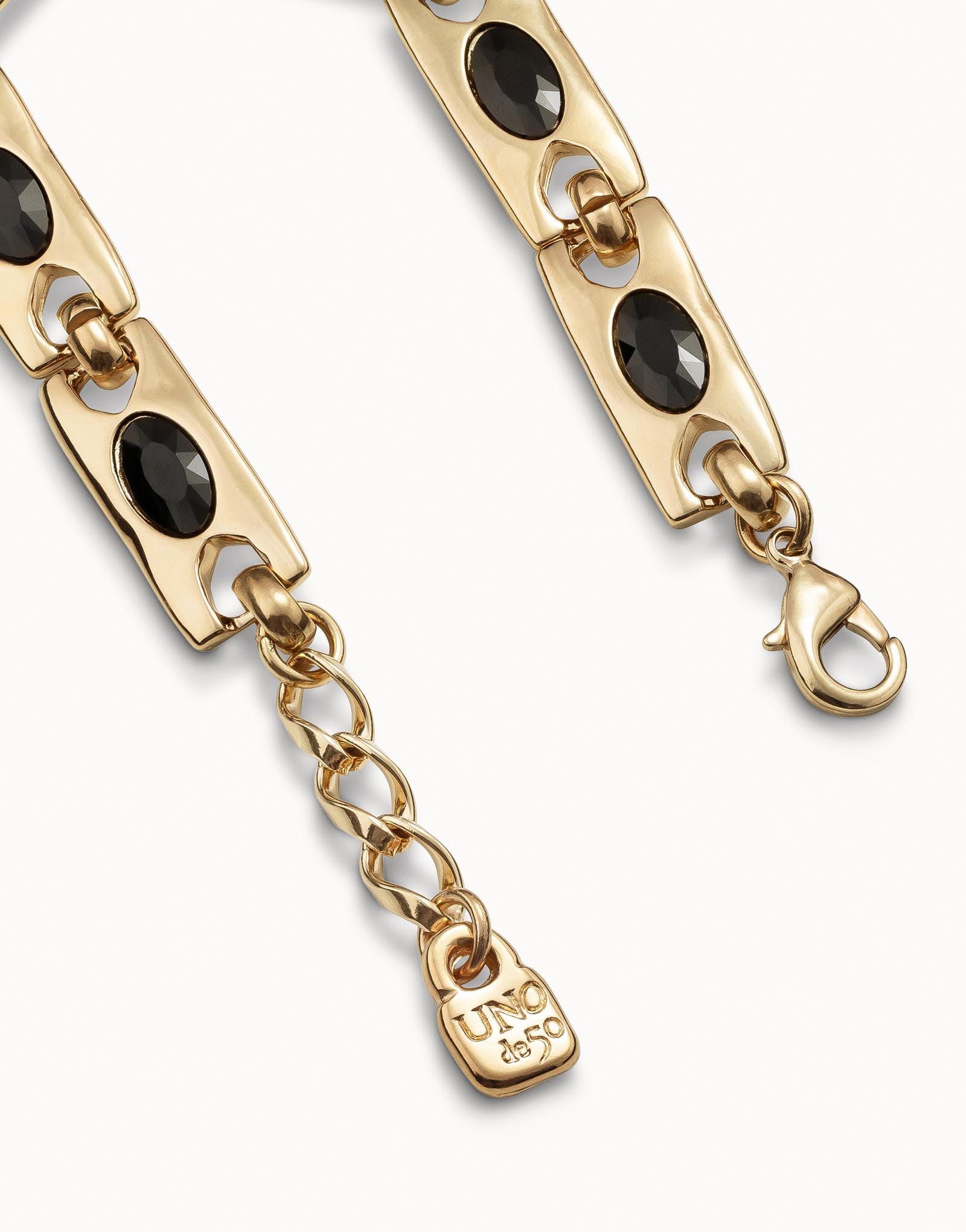 Pulsera Uno de 50 The Crown bañada en oro de 18k con eslabones y cristales negros