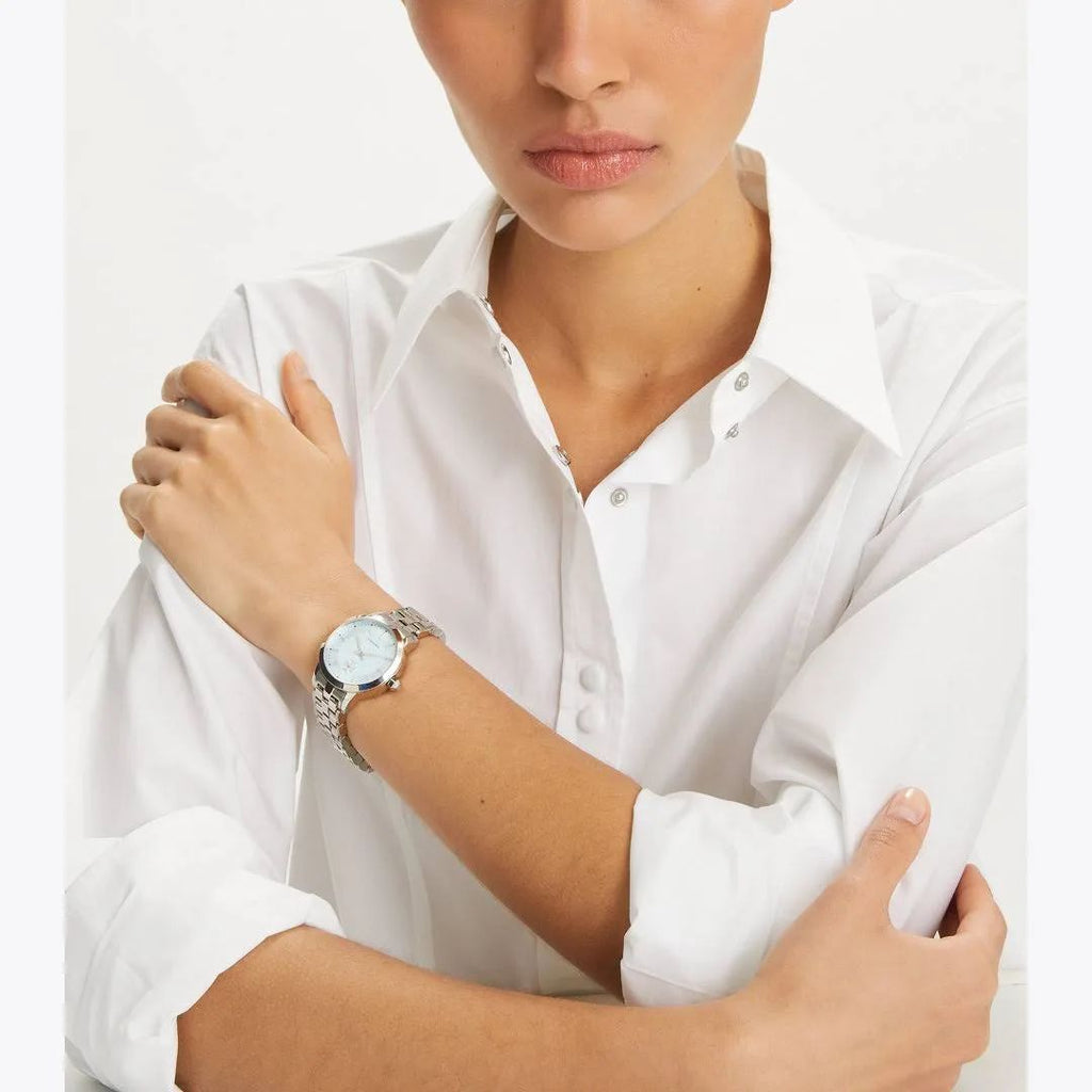 Reloj Tory Burch fondo celeste plateado