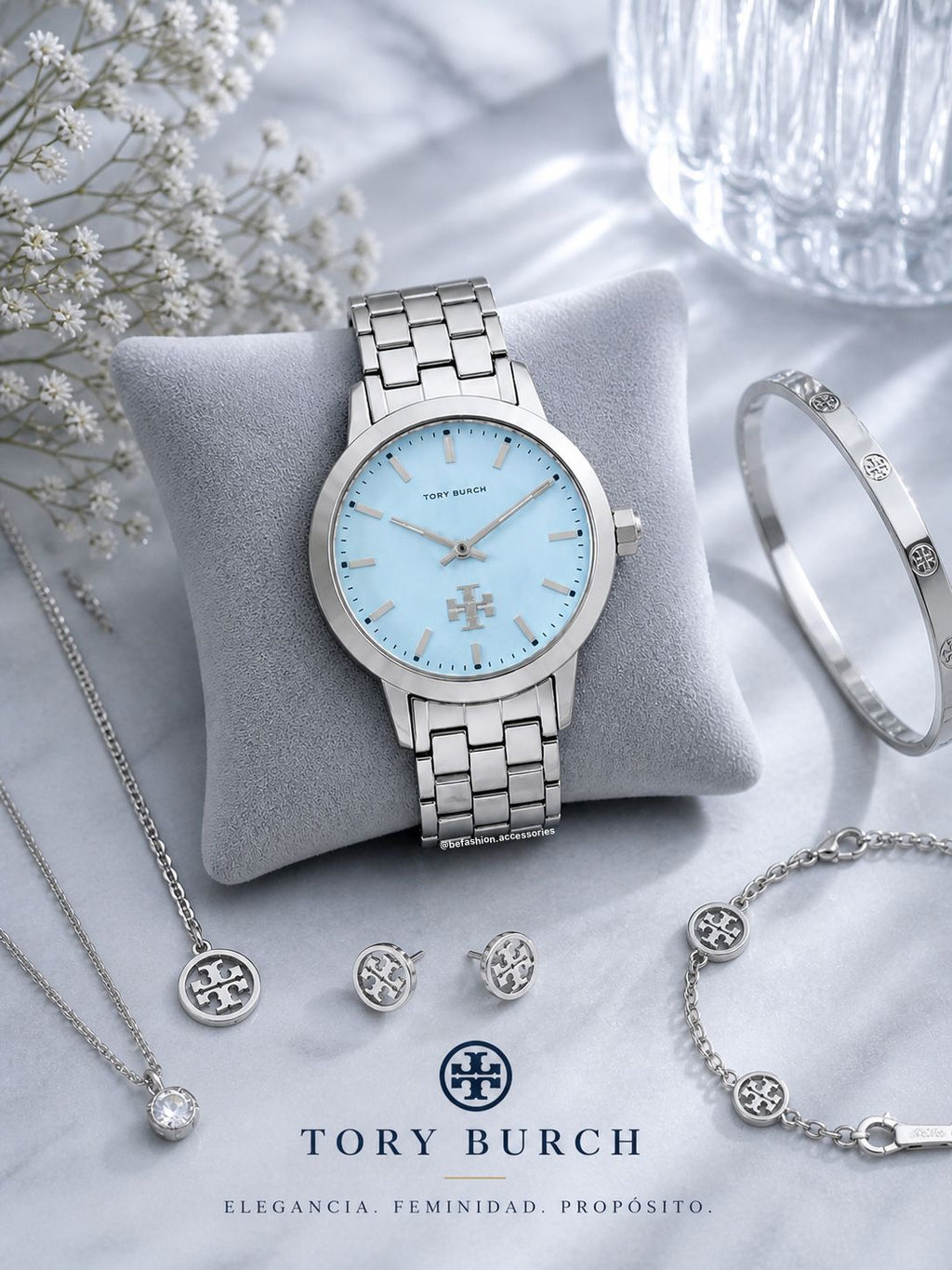 Reloj Tory Burch fondo celeste plateado