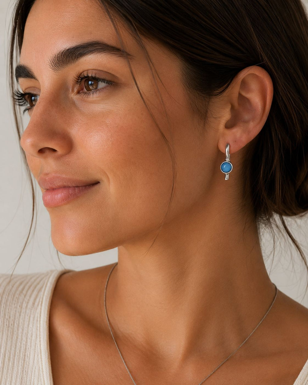 Aros Uno de 50 alargados cristal celeste