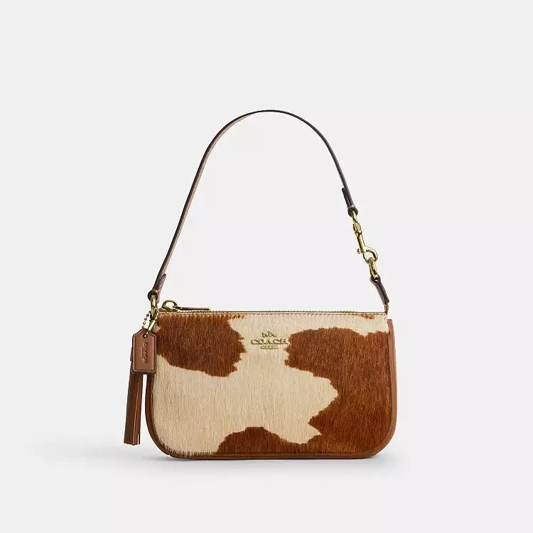 Cartera Coach Nolita estampado de vaca