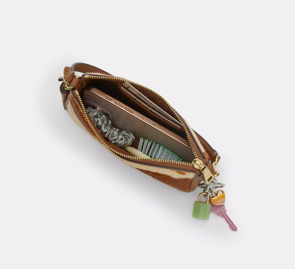 Cartera Coach Nolita estampado de vaca