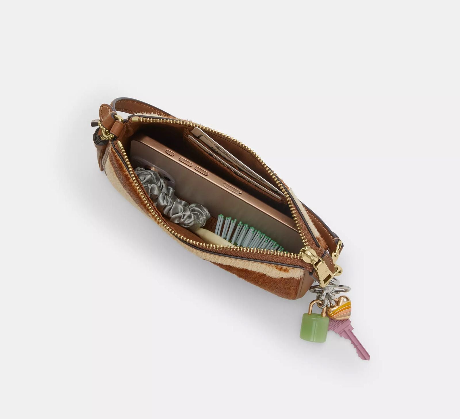 Cartera Coach Nolita estampado de vaca