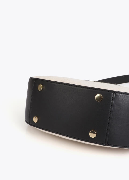 Cartera Lola Casademunt efecto piel y canvas bicolor crudo-negro