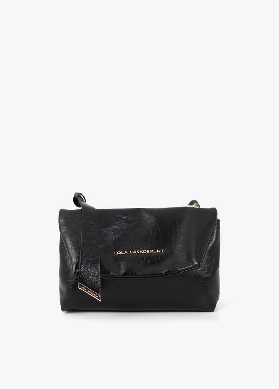 Cartera Lola Casademunt con solapa detalle lazo negro