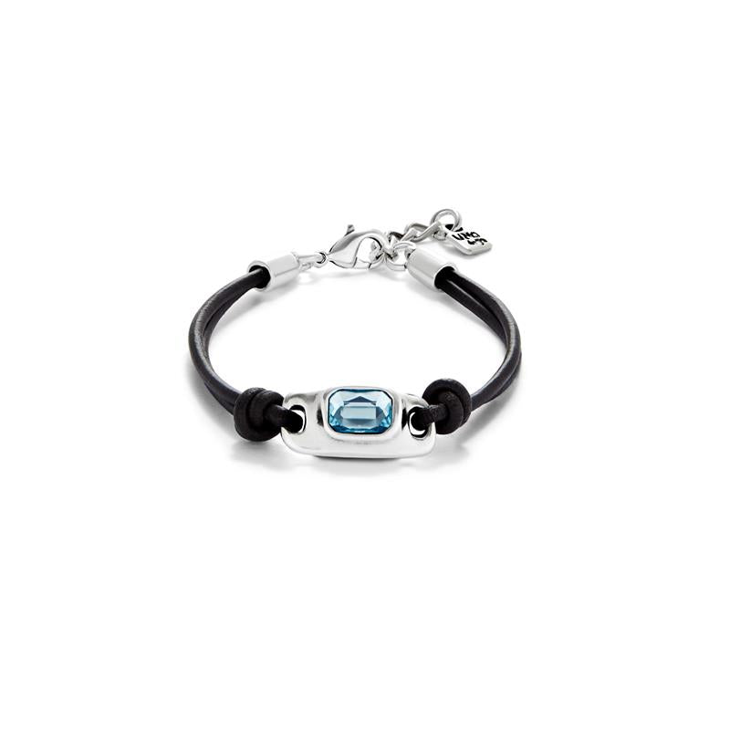 Pulsera Uno de 50 Ser Magnetica cuero negro con detalles plata y cristal celeste UNOde50